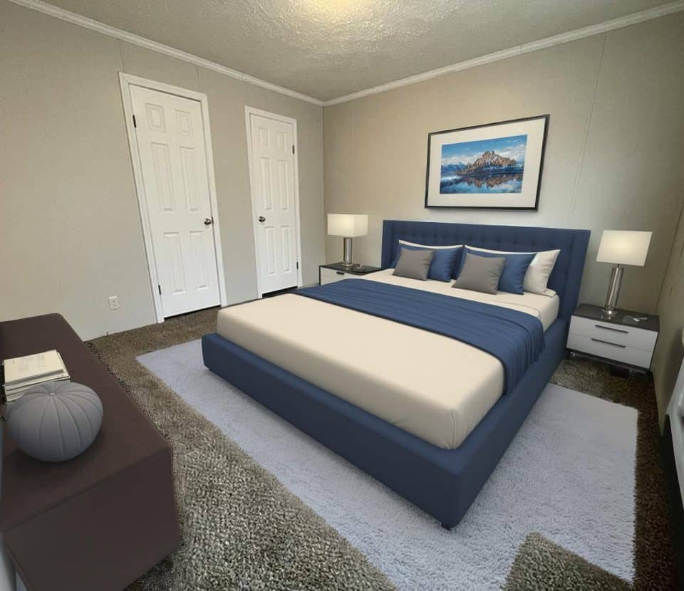 A bedroom with a bed and a table.